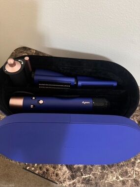 Dyson hair styler in deep blue with rose gold trim